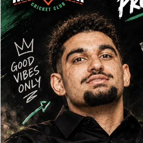 Aroon "Roo" in a black club shirt